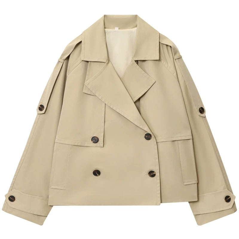 Dam i lång kaki trenchcoat – stilren höstlook för stad och arbete
