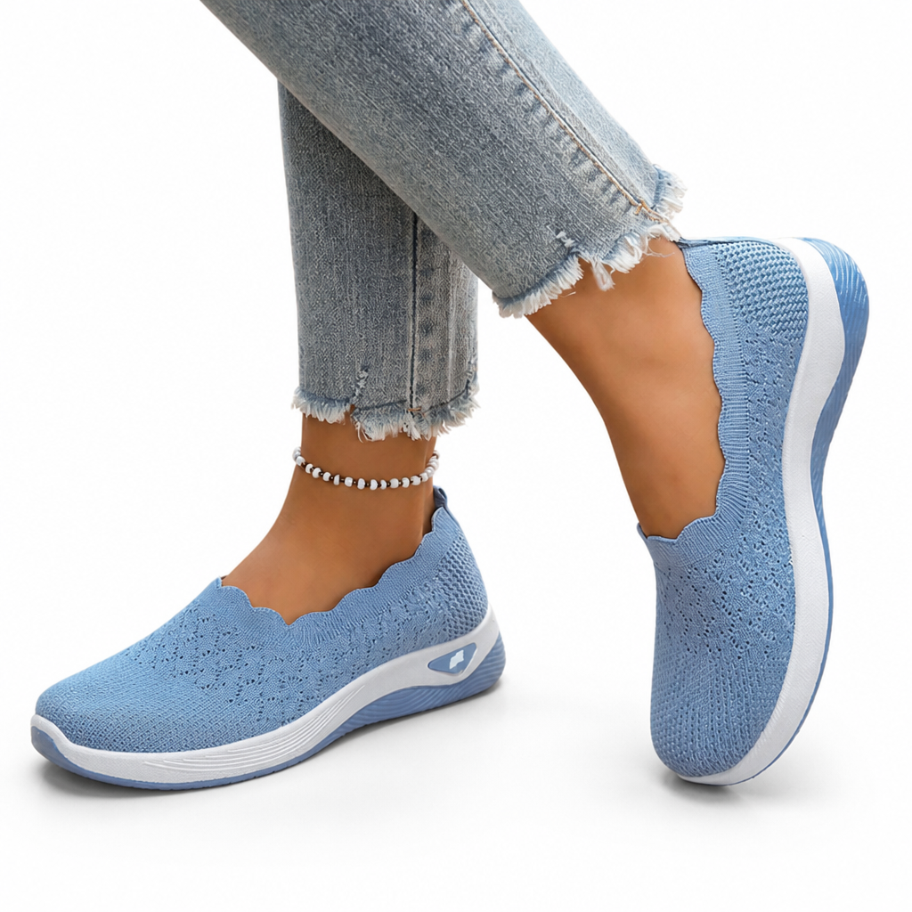 Briella lila dam-sneakers på fot – visar flexibel och dämpande sula