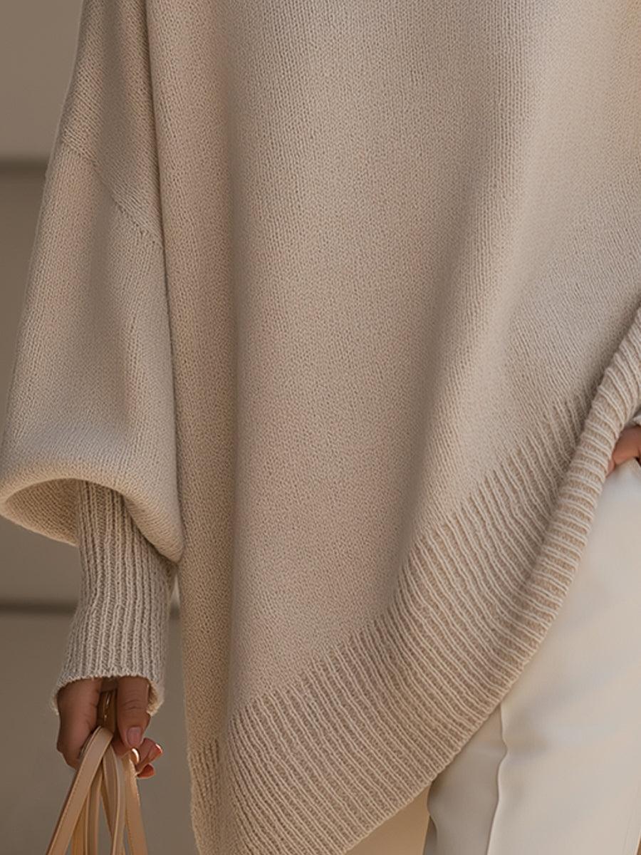 Mira dam poncho stylas med jeans och byxor för en modern layered look