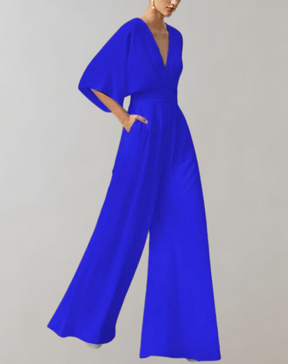 Suzette Jumpsuit Dam – Elegant Jumpsuit med Djup V-ringning & Vida Ben för en Raffinerad Look