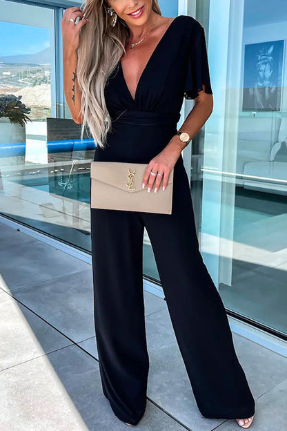 Sara Jumpsuit Dam – Trendig Jumpsuit med V-ringning, Volanger & Vida Ben i Bomullsblandning