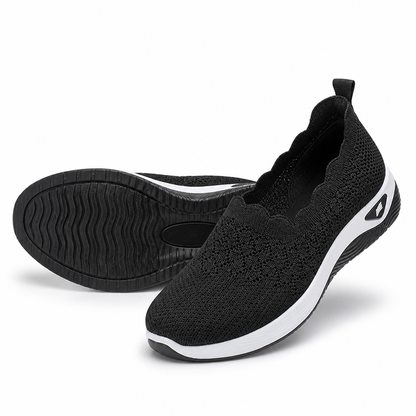 Briella bruna dam-sneakers visade framifrån med tydlig slip-on-design