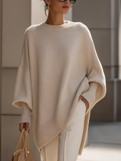 Mira oversized poncho i beige mjuk stickad kvalitet för dam